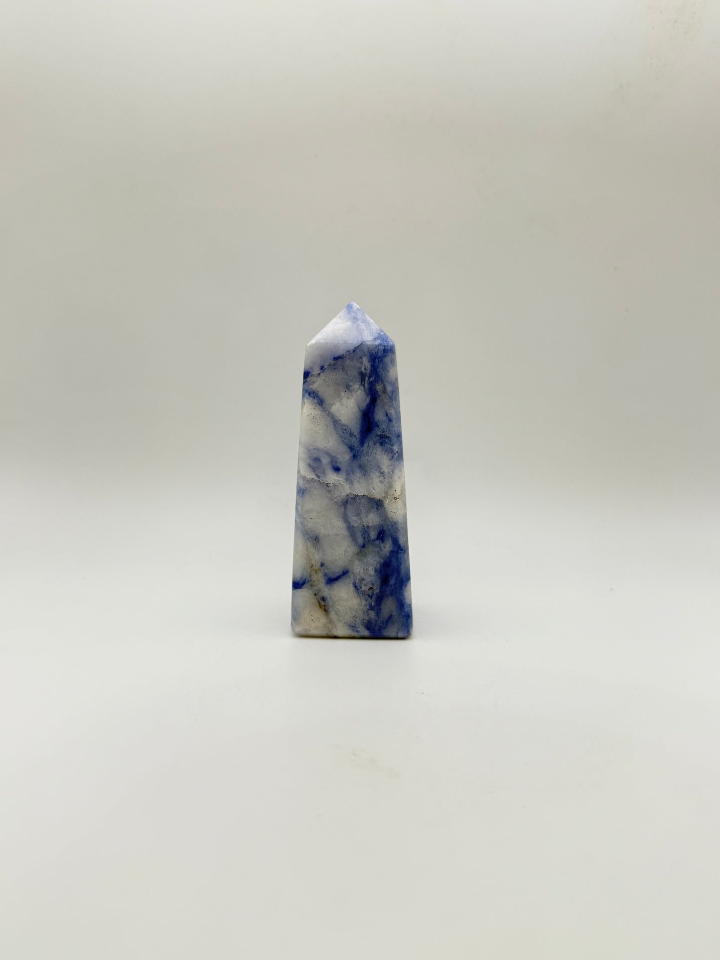 Afghanite four sided tower. Height of 3 1/2 inches, width of 1 1/4 inches.