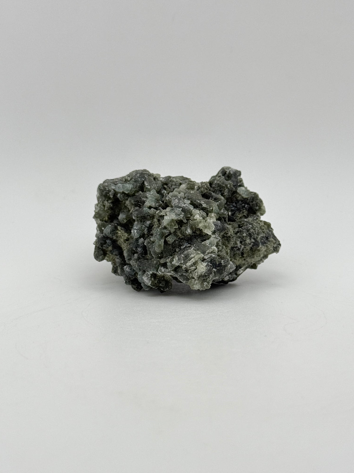 Raw prehnite specimen with amazing green color.