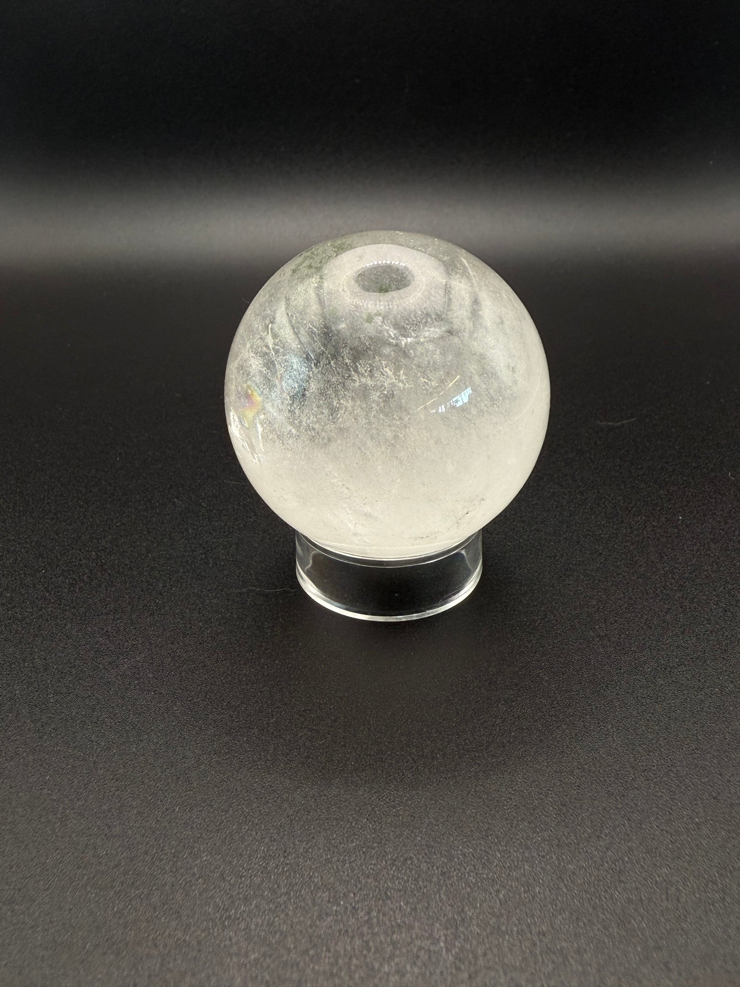 Clear quartz polished crystal sphere.