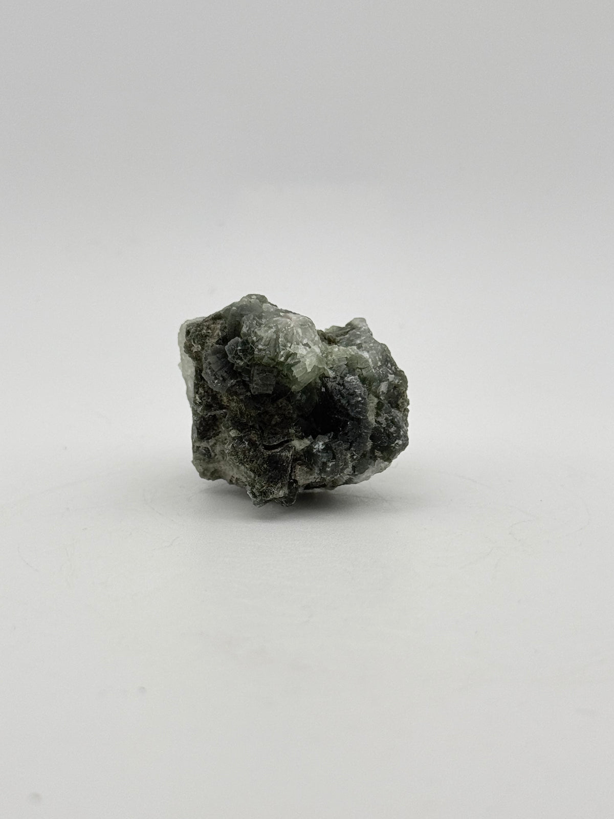 Raw prehnite specimen with amazing green color.