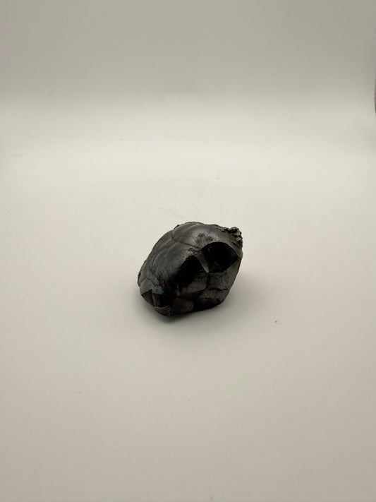 Small raw hematite specimen.