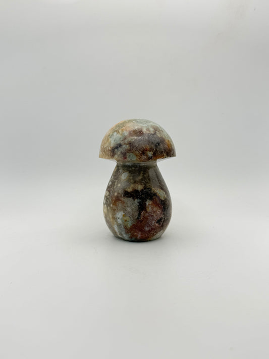 Ocean jasper stone in the shape of a mushroom.
