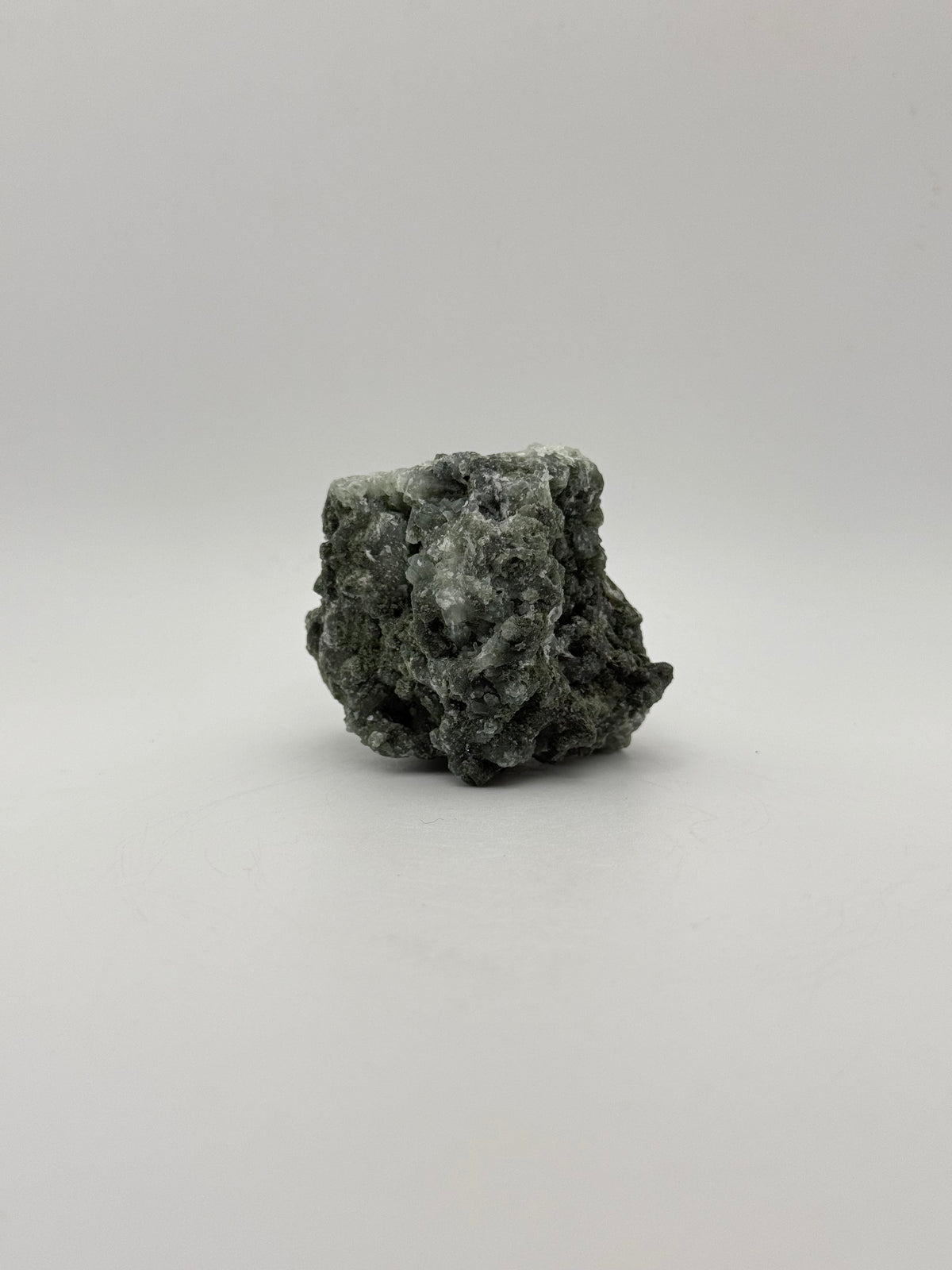 Raw prehnite specimen with amazing green color.