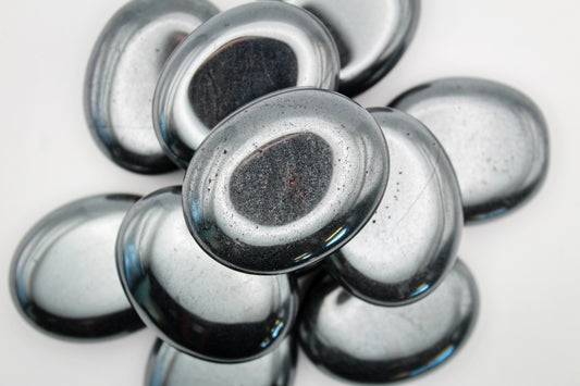 Polished Hematite palm stones.