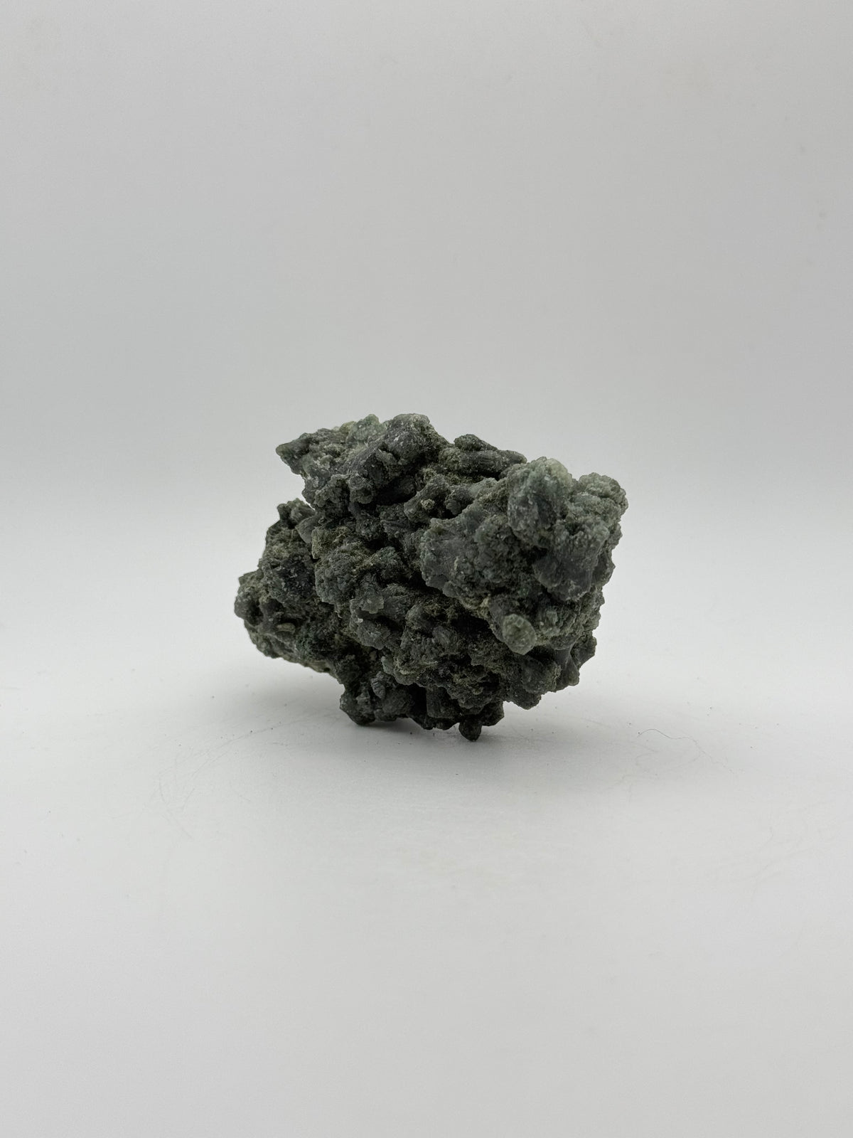 Raw prehnite specimen with amazing green color.