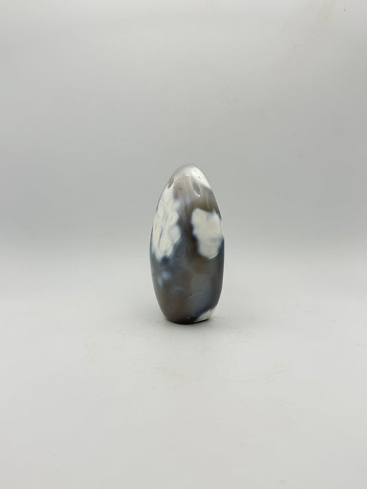 Polished orca agate free form.