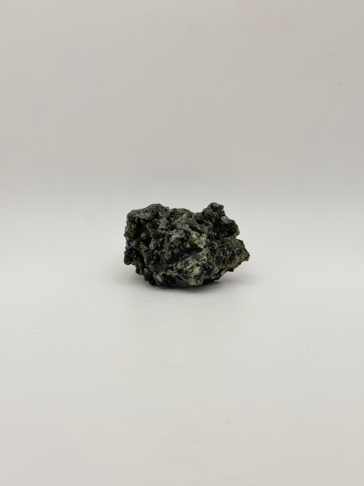 Raw prehnite specimen with amazing green color.