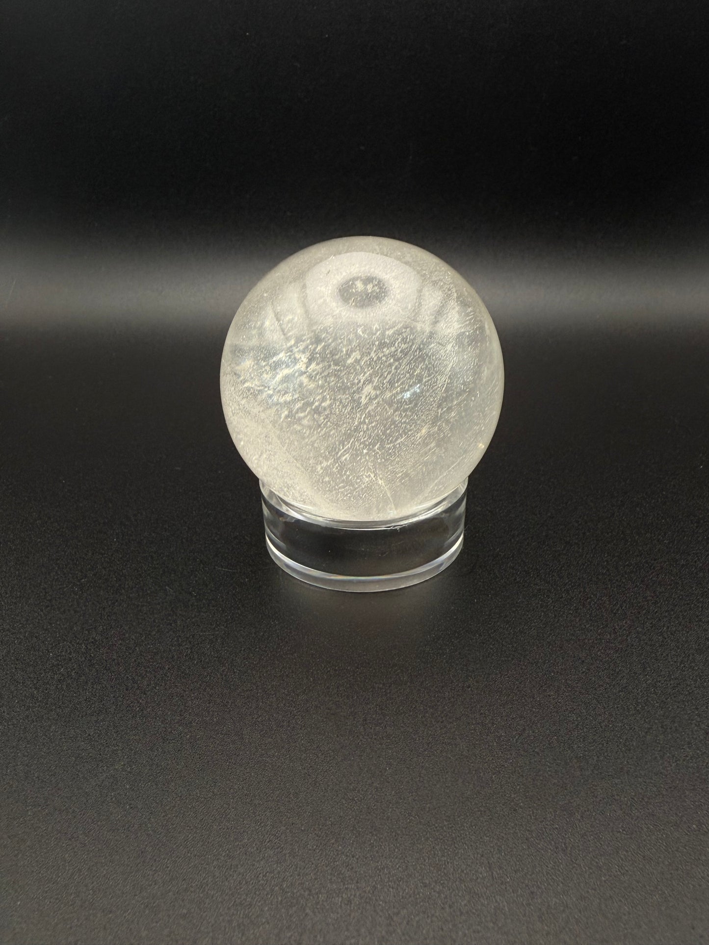 Clear quartz polished crystal sphere.