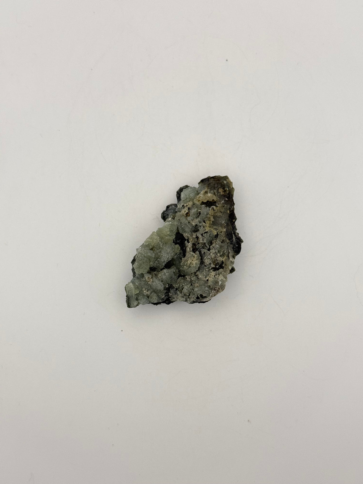 Raw prehnite specimen with amazing green color.