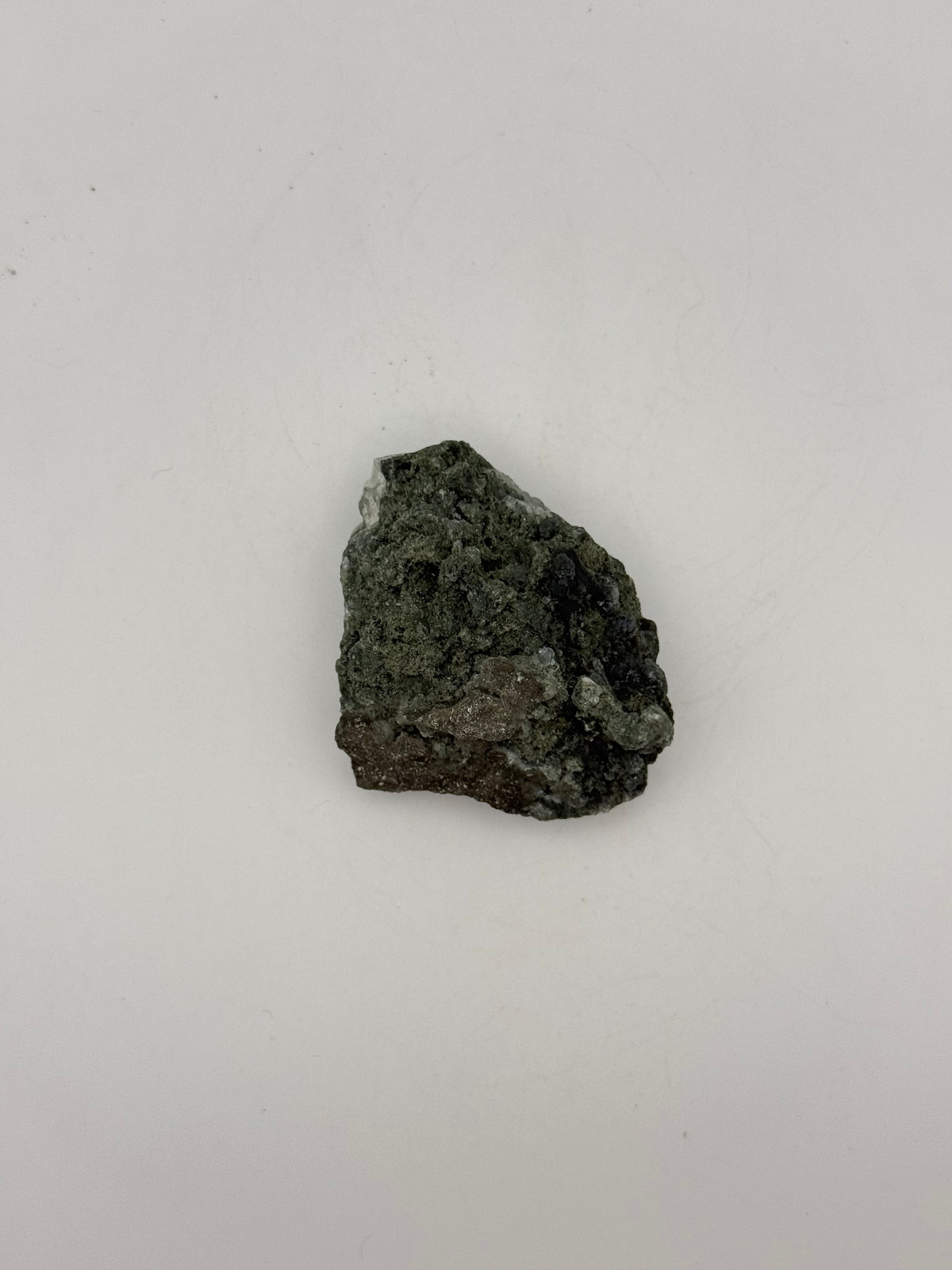 Raw prehnite specimen with amazing green color.