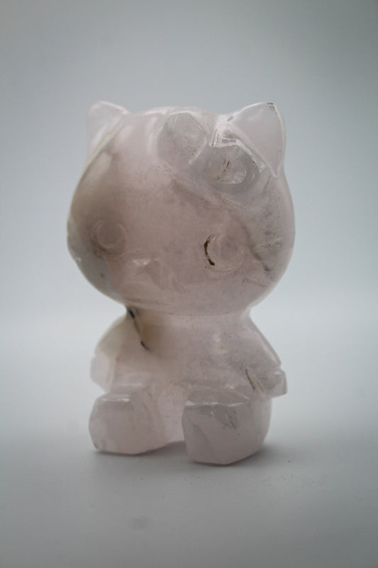 Pink Calcite crystal in the shape of Hello Kitty.