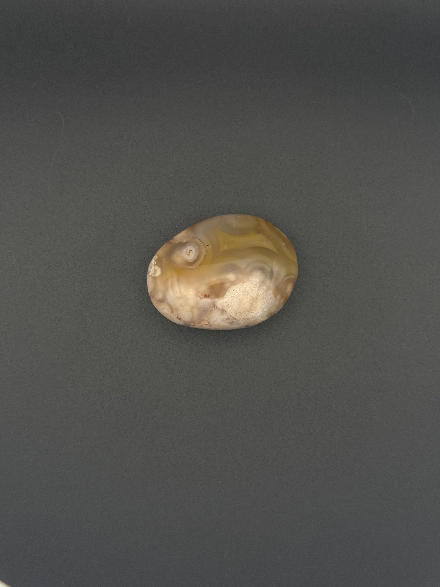 Flower agate polished crystal palm stone.