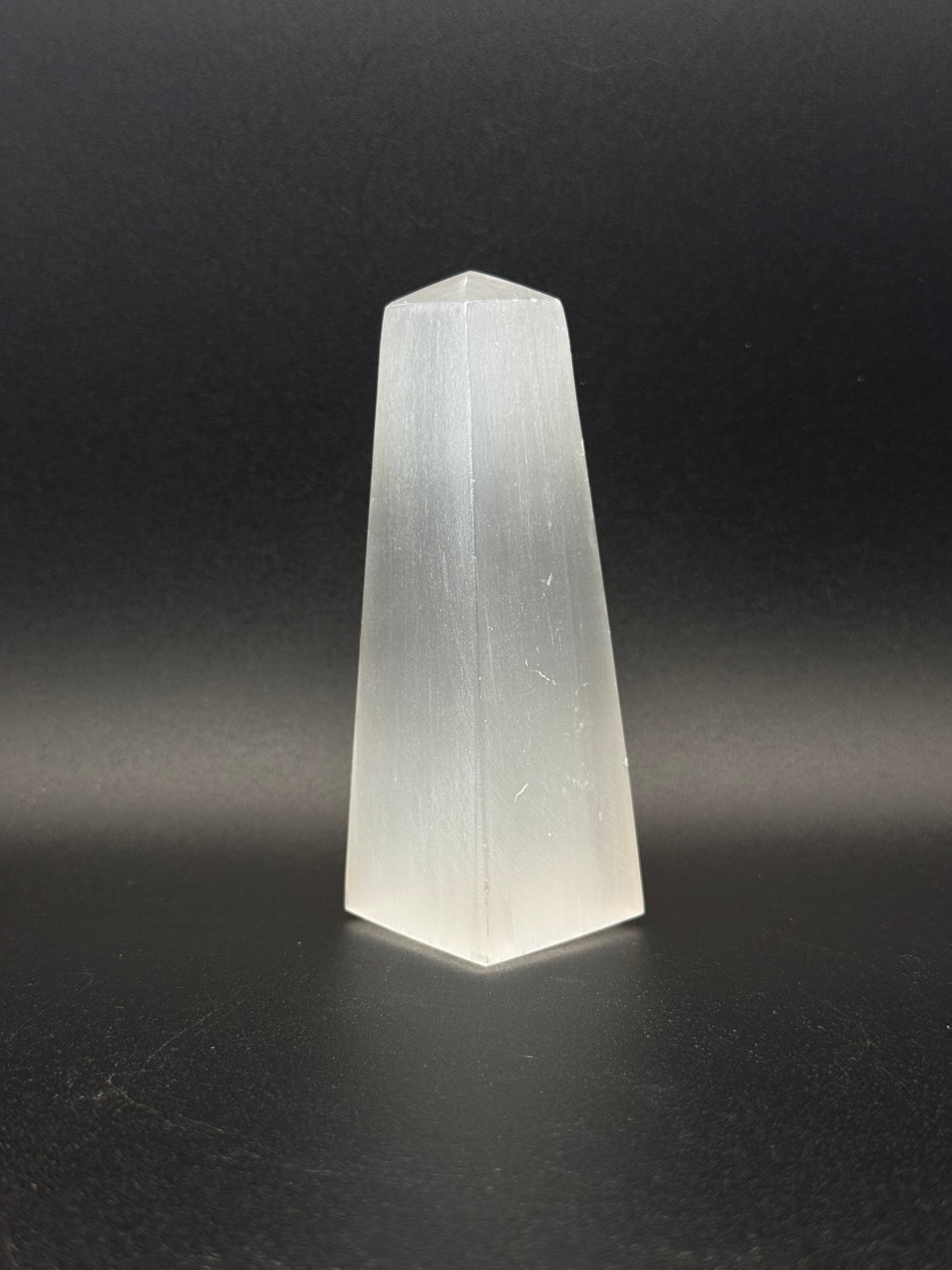 Selenite tower that is 10cm tall.