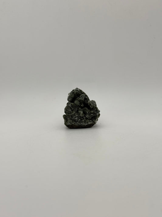 Raw prehnite specimen with amazing green color.