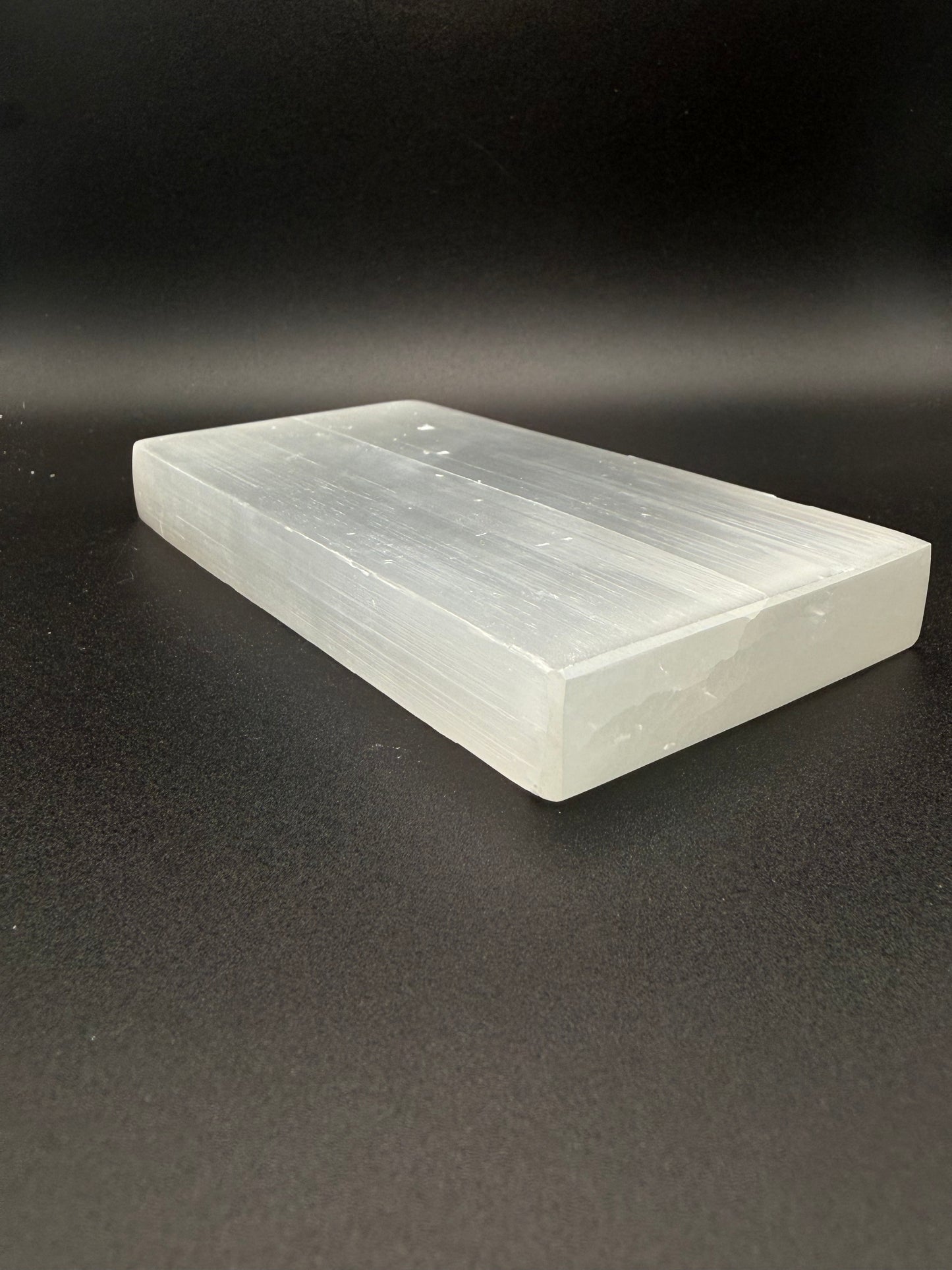 Selenite plate in the shape of a rectangle.
