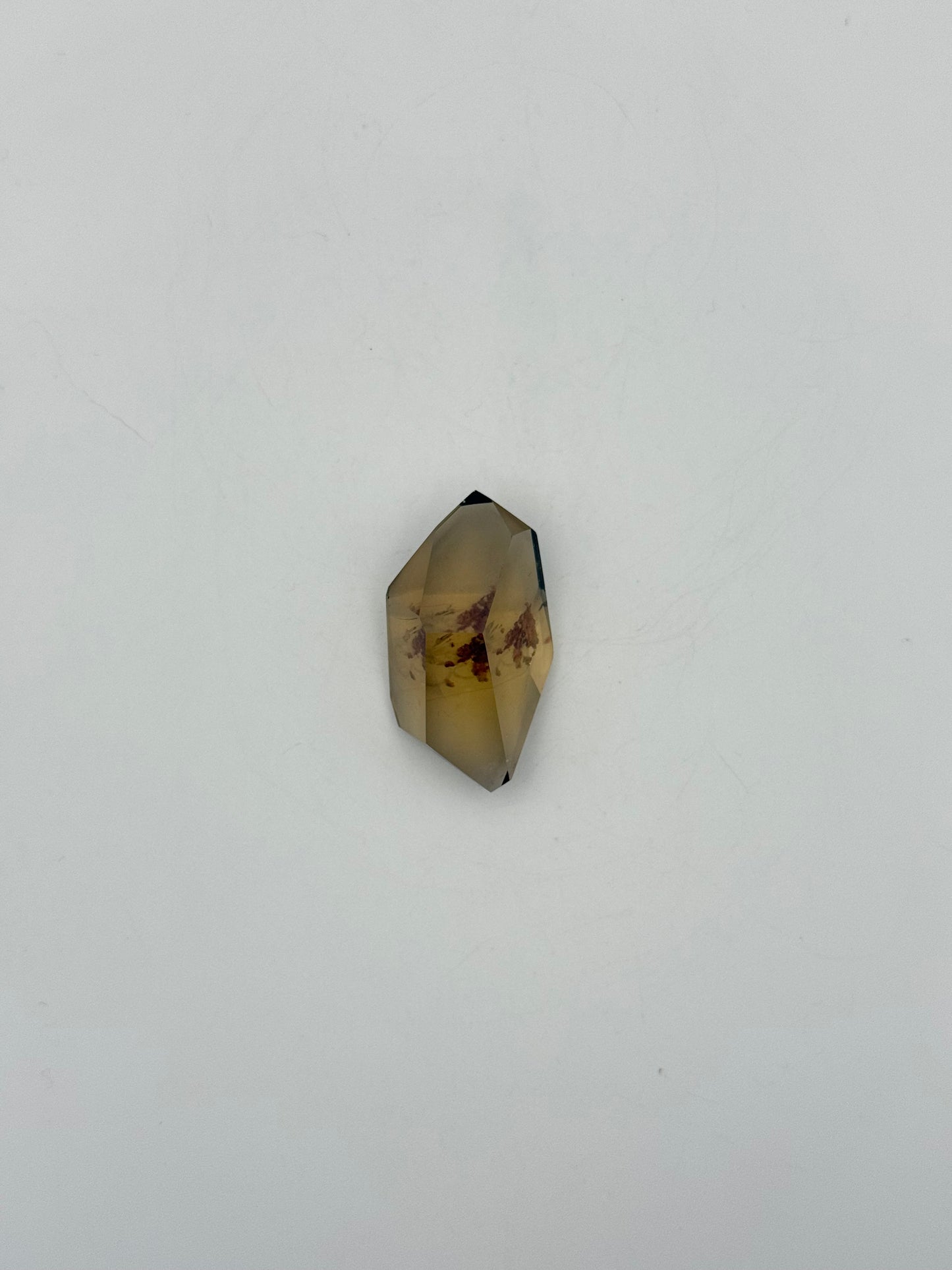 Polished natural citrine point.