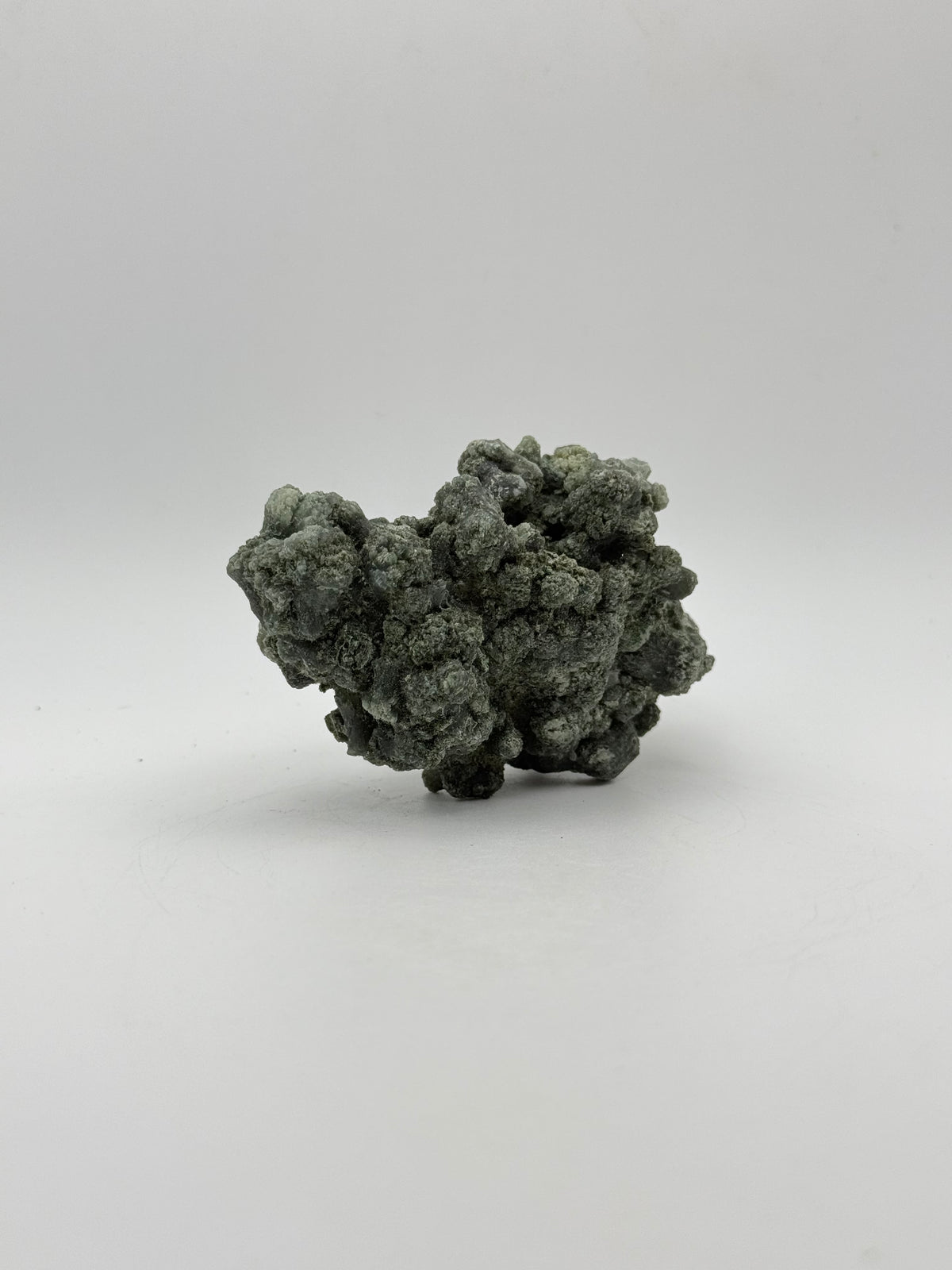 Raw prehnite specimen with amazing green color.