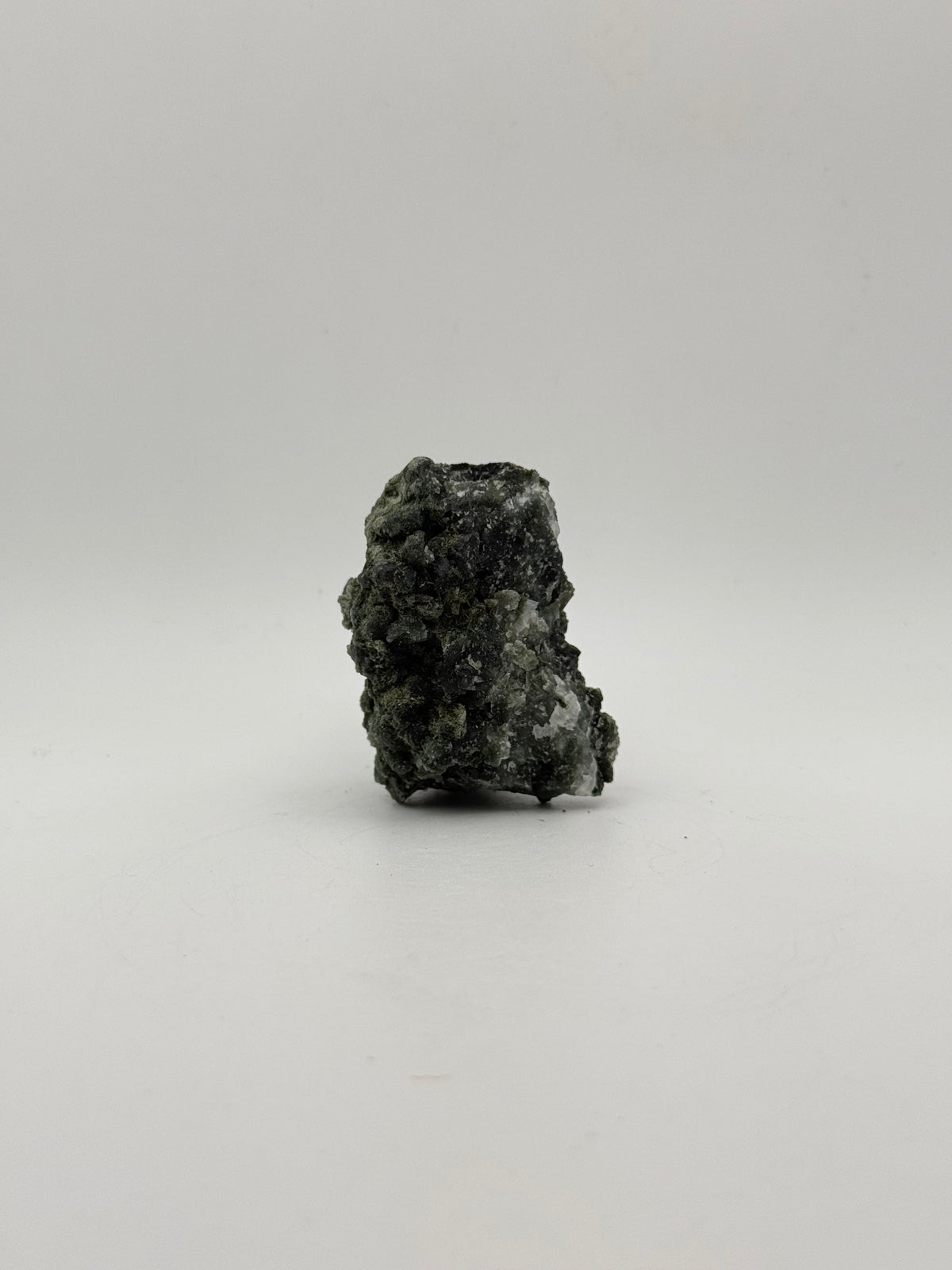 Raw prehnite specimen with amazing green color.