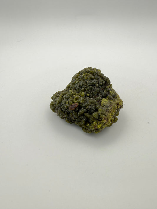 Epidote crystal cluster with good green color.