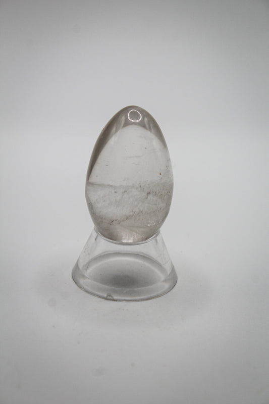 A polished clear quartz egg.