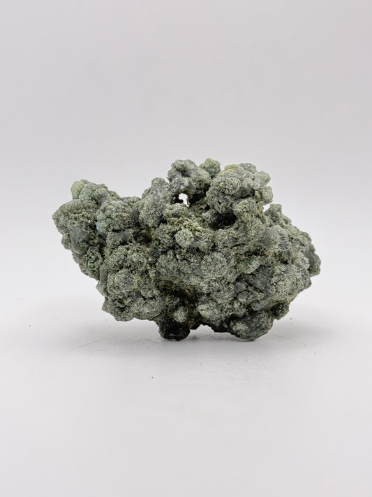 Raw prehnite specimen with amazing green color.