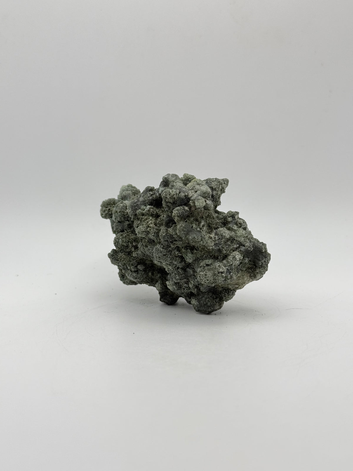 Raw prehnite specimen with amazing green color.