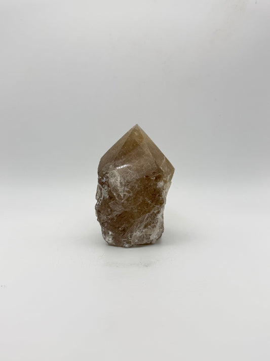 Smoky quartz tower with the top side polished and bottom natural.