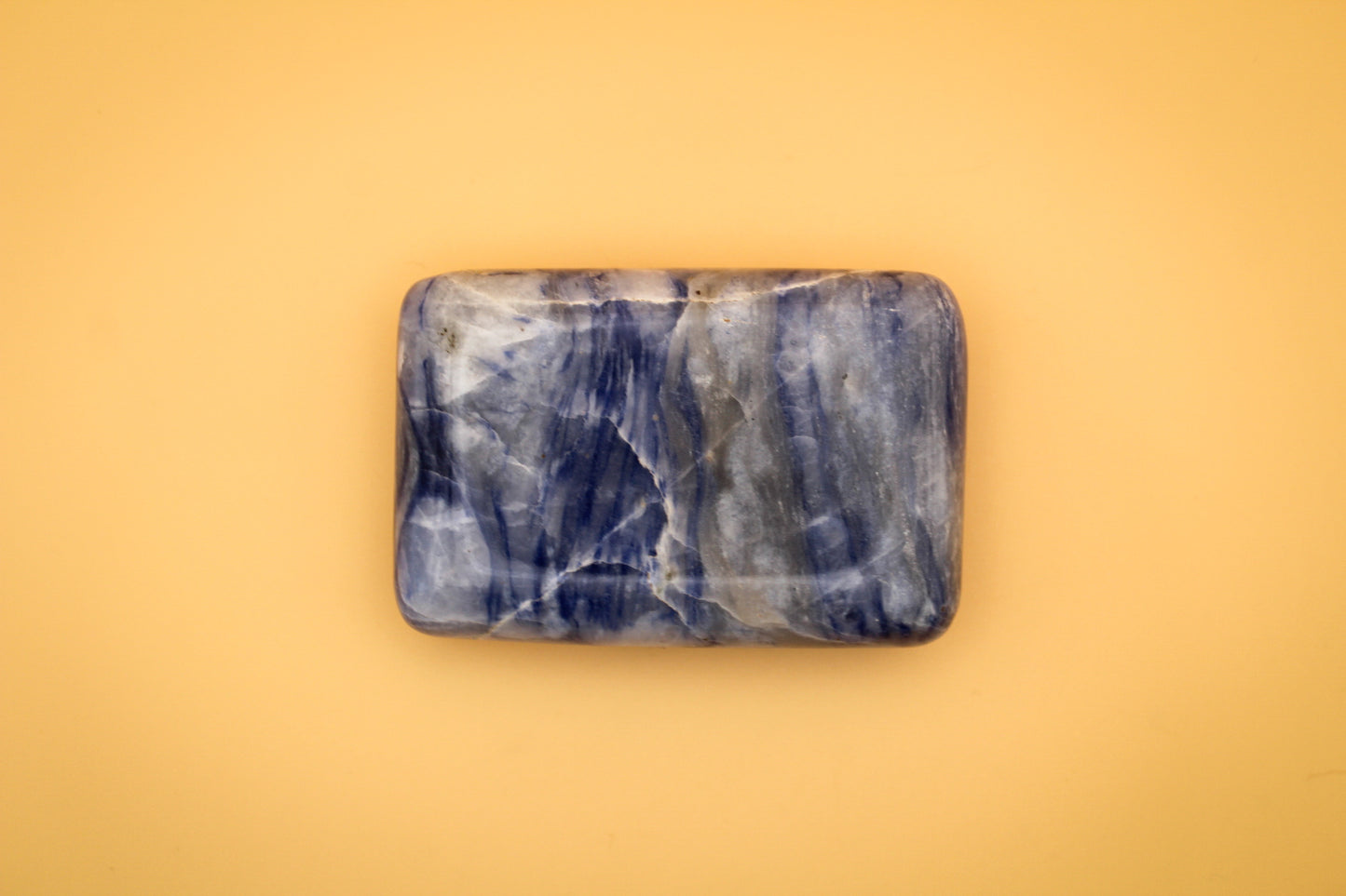Rectangle soap-shaped afghanite polished crystal.