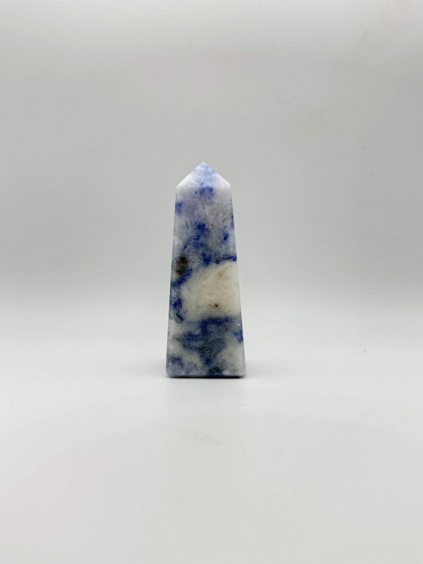 Afghanite four sided tower. Height of 3 1/2 inches, width of 1 1/4 inches.