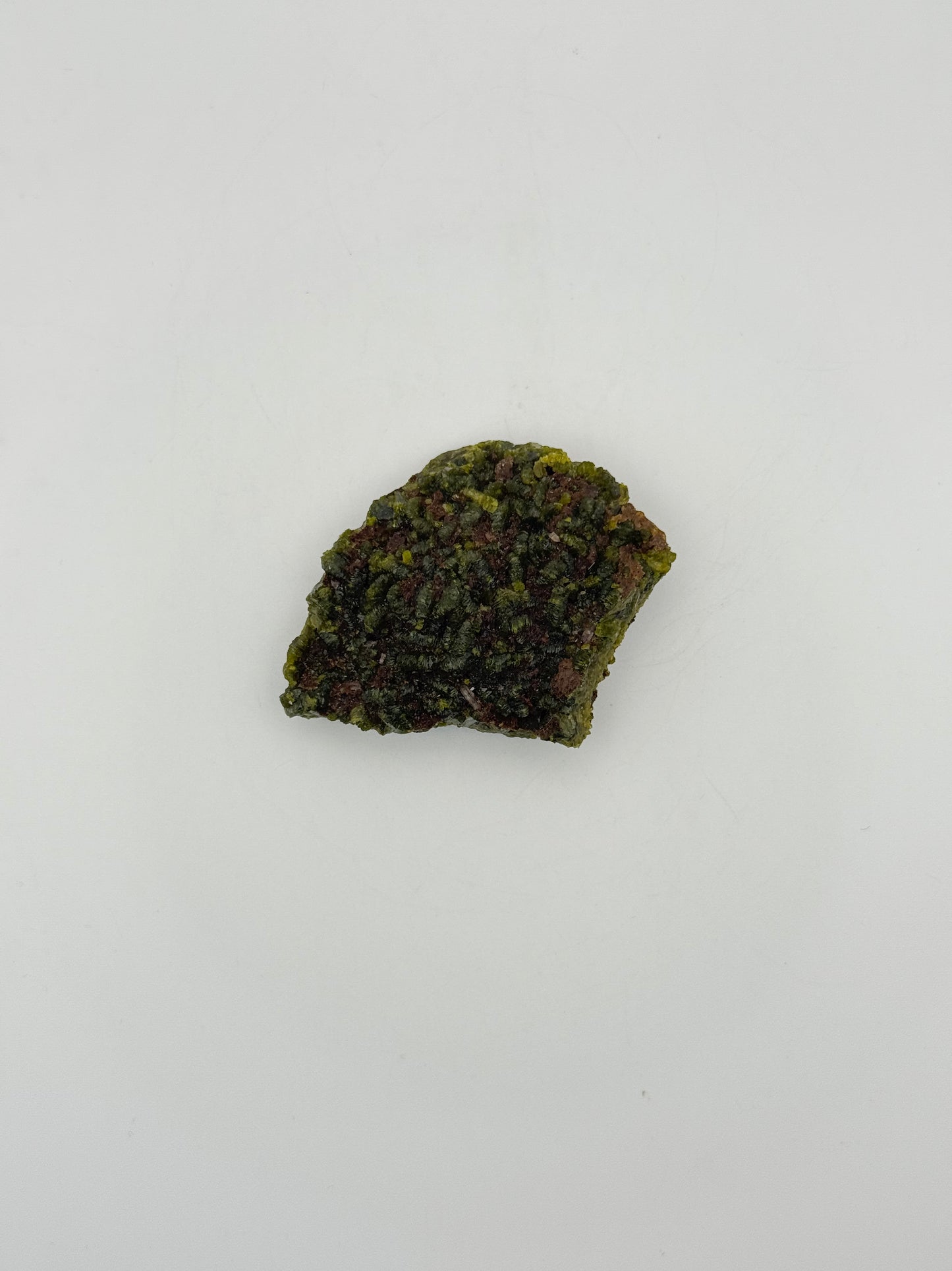 Epidote crystal cluster with good green color.