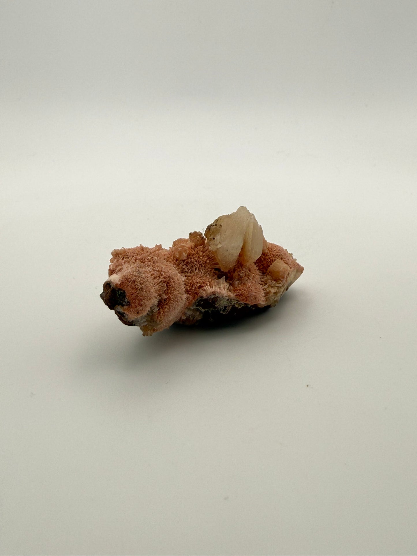 Raw Messolite crystal.