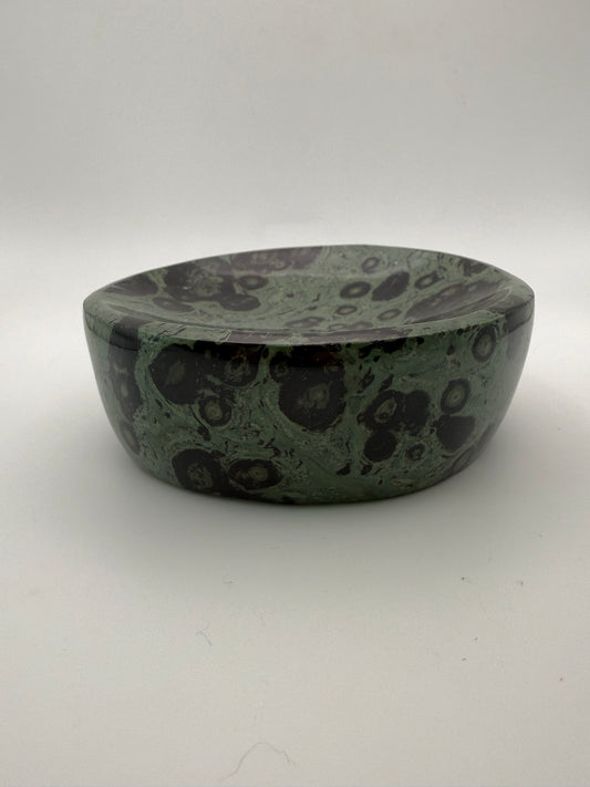 Polished kambaba jasper in the shape of a bowl.