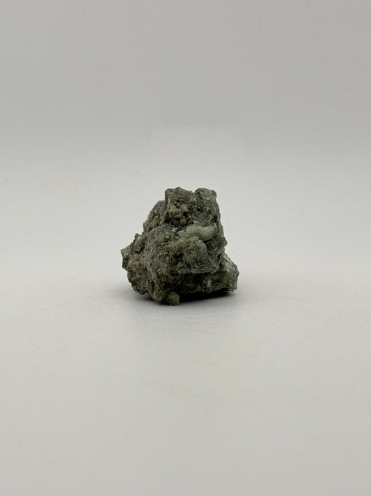 Raw prehnite specimen with amazing green color.