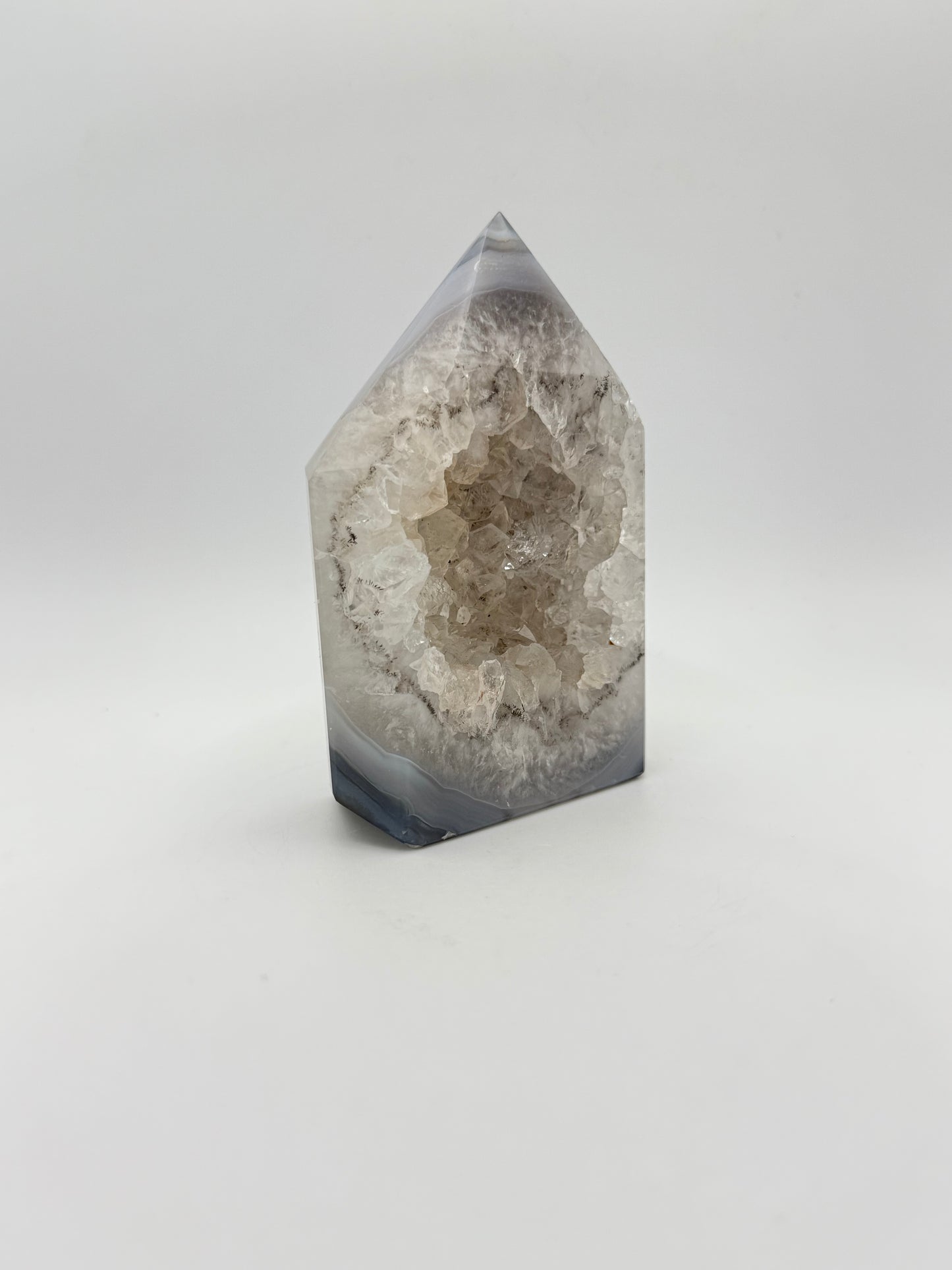 Polished druzy agate tower. a little over 4 inches tall.