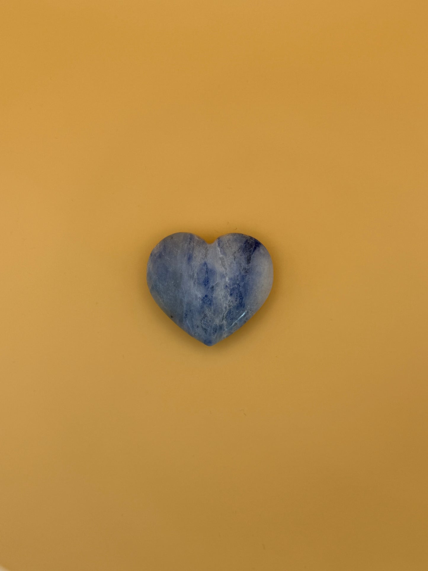 Afghanite heart-shaped stone. Approximately 1 7/8inches by 1 3/4inches big