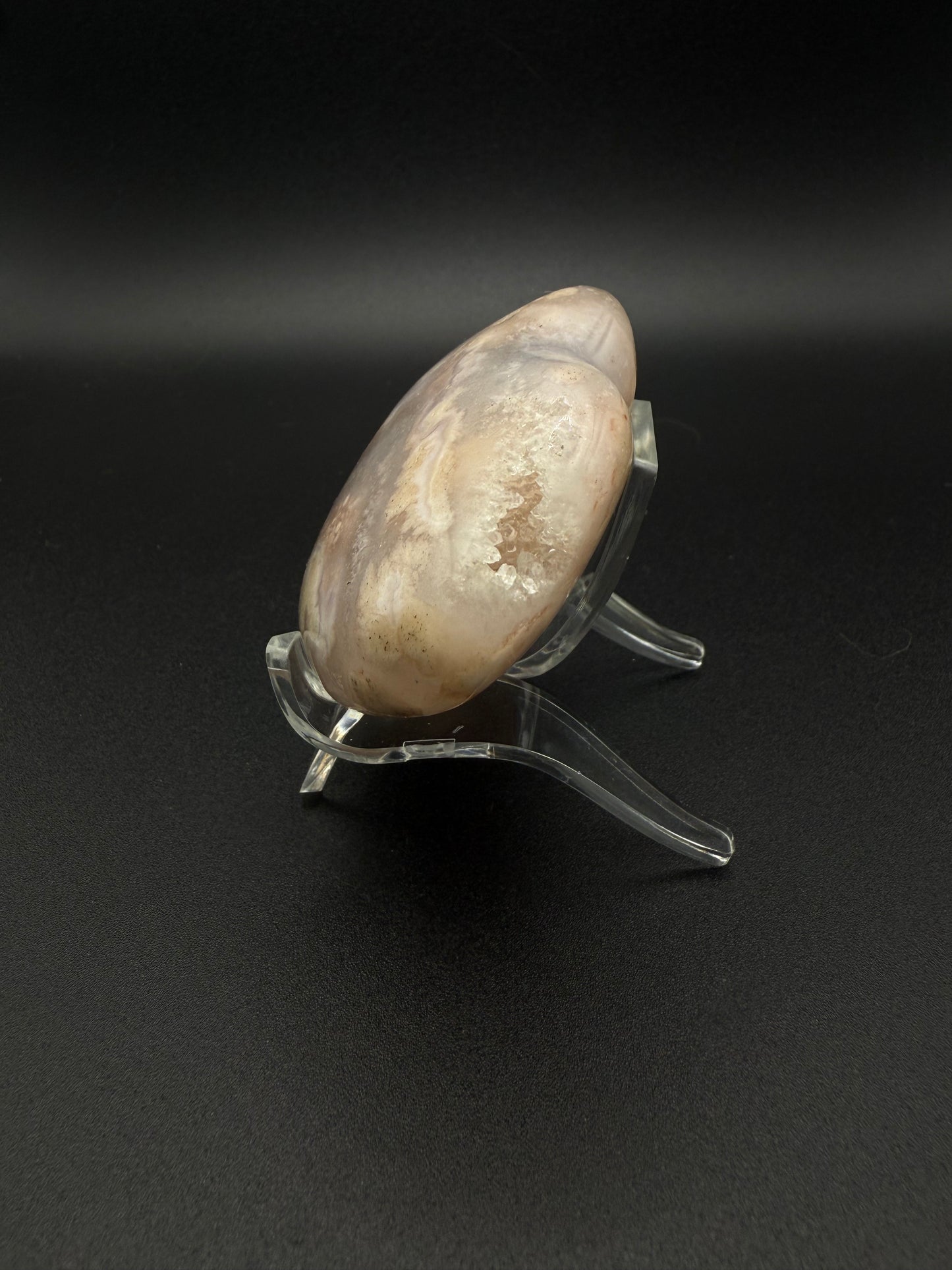 Heart-shaped polished flower agate crystal.