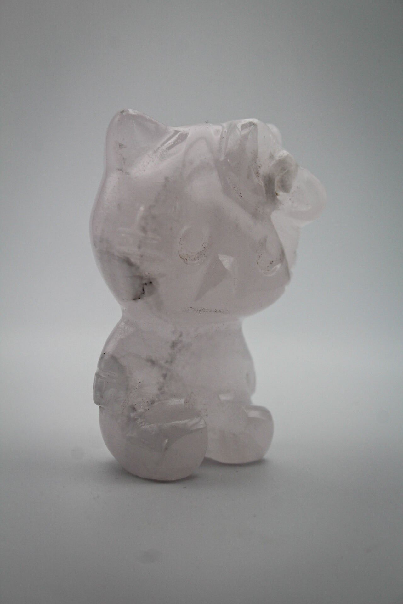 Pink Calcite crystal in the shape of Hello Kitty.