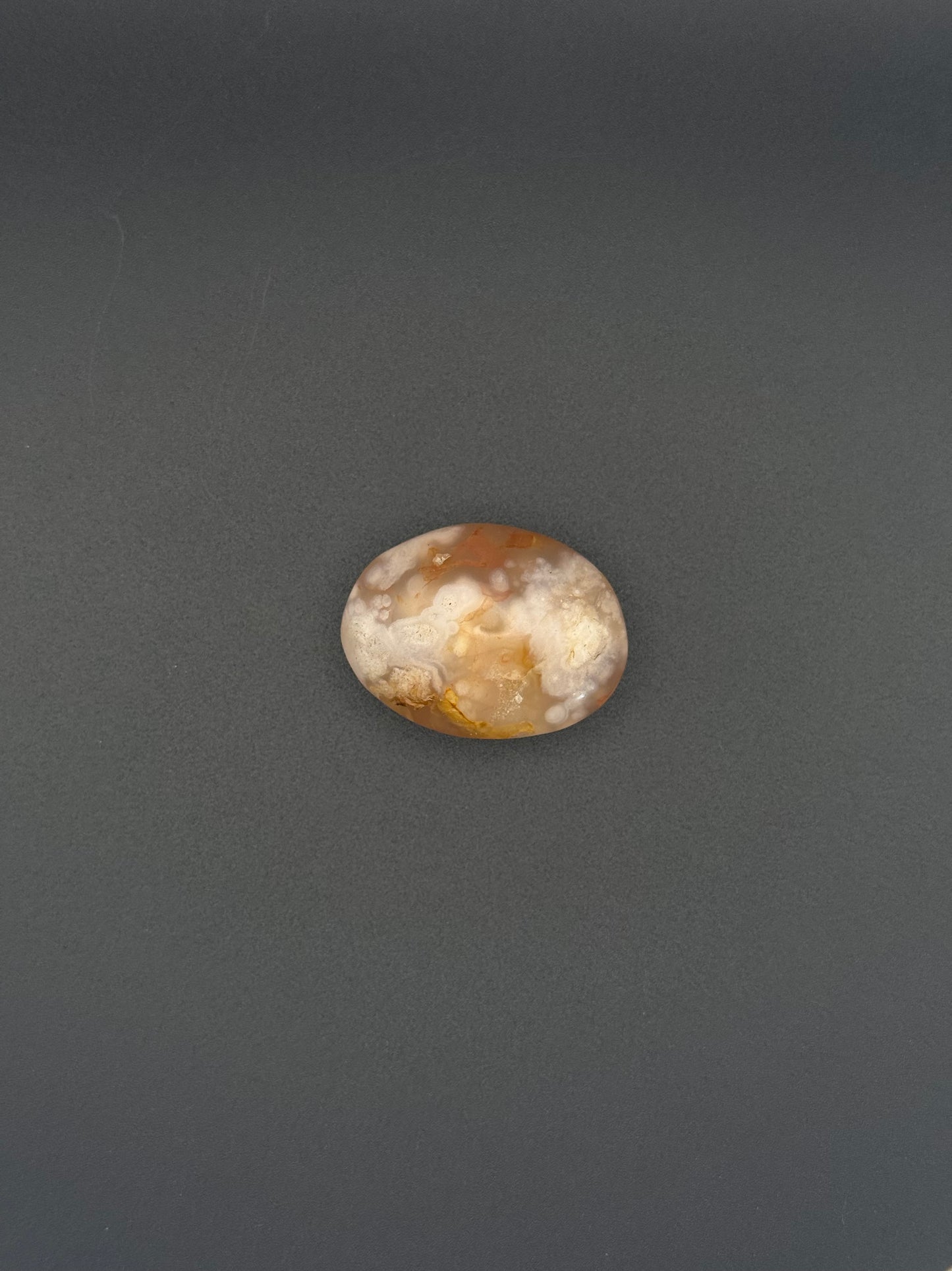 Flower agate polished crystal palm stone.