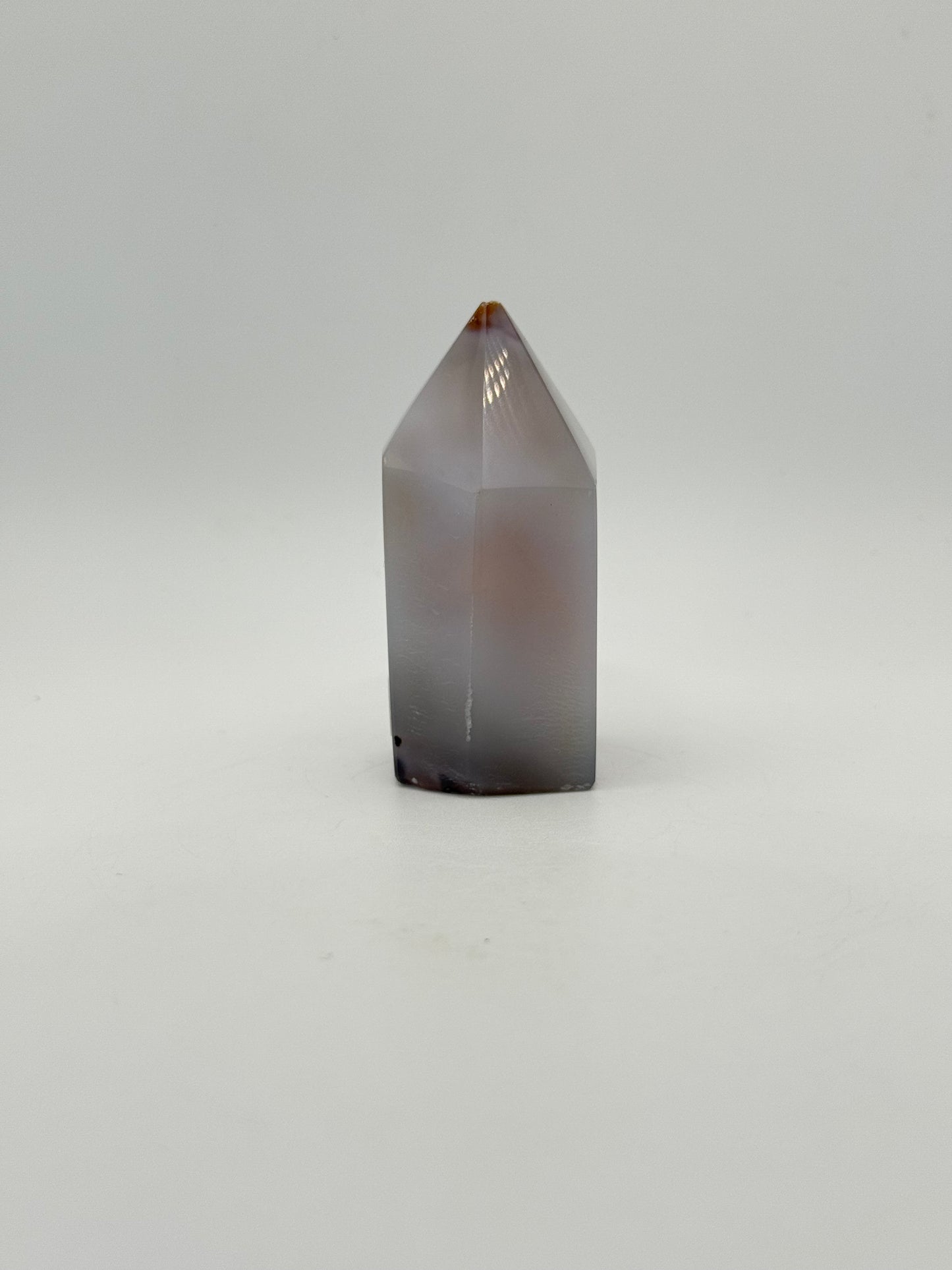 Polished druzy agate tower. About 2.5 inches tall.