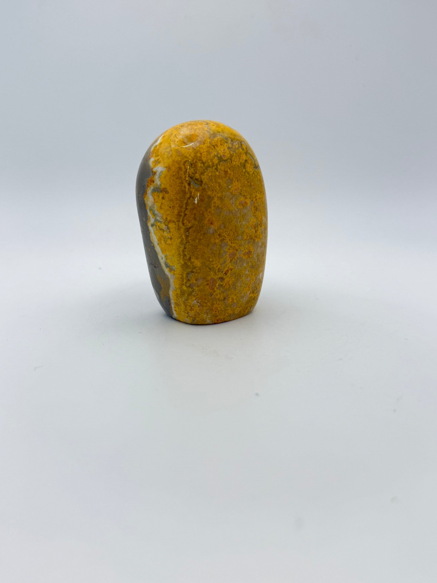 Bumble Bee Jasper polished free form, just under 3 inches tall.
