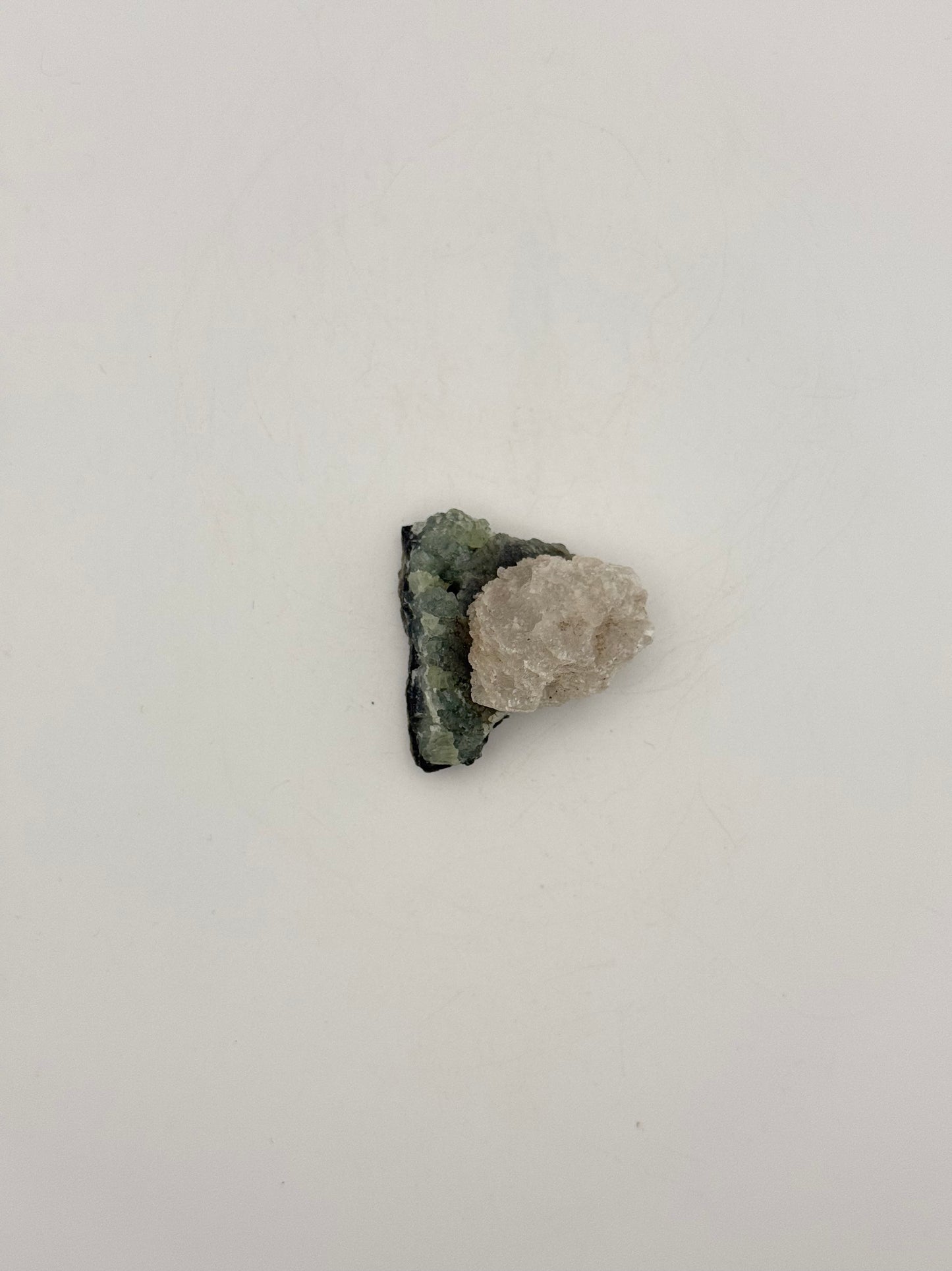 Raw prehnite specimen with amazing green color.