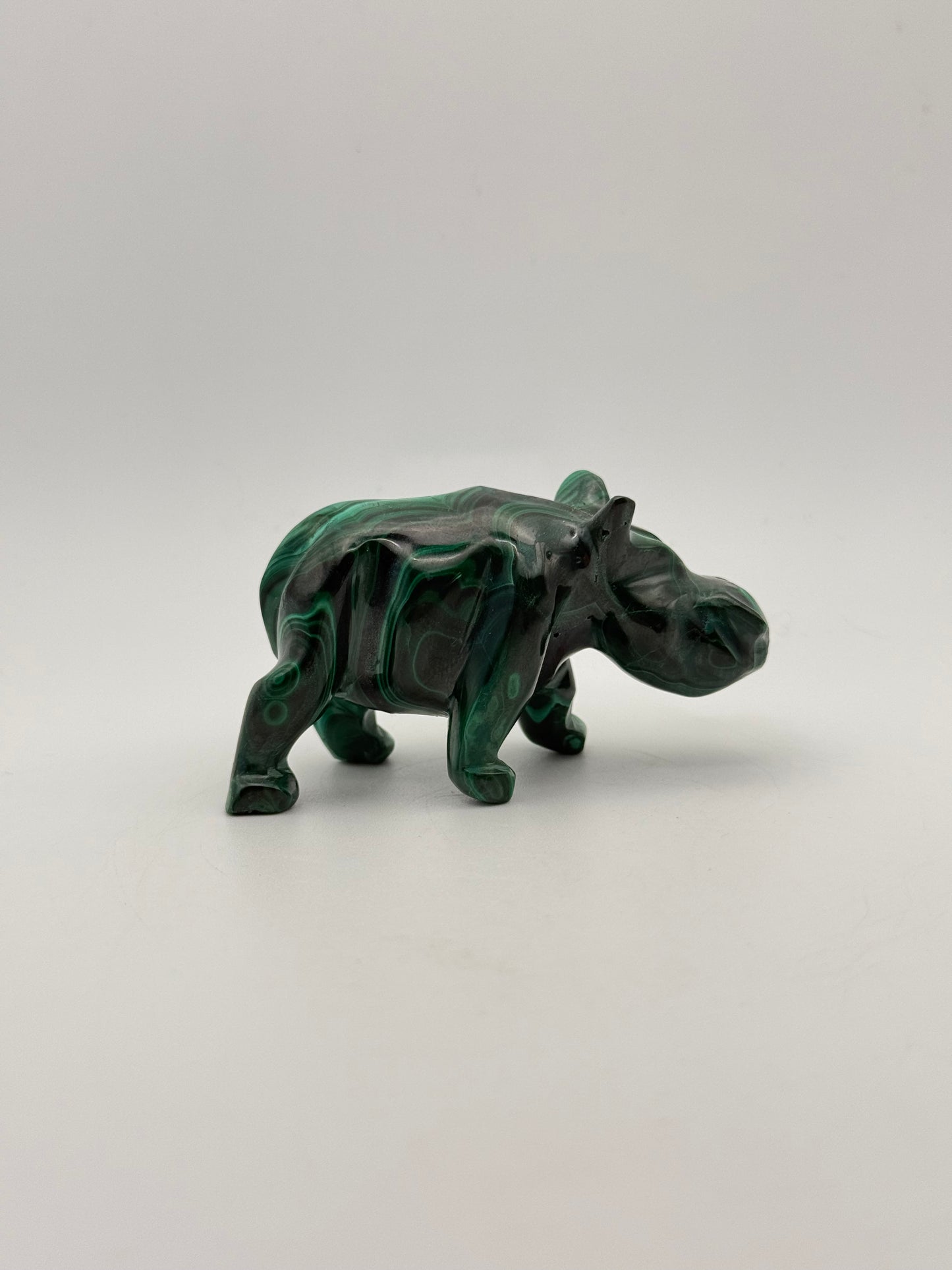 Malachite rhino carving.