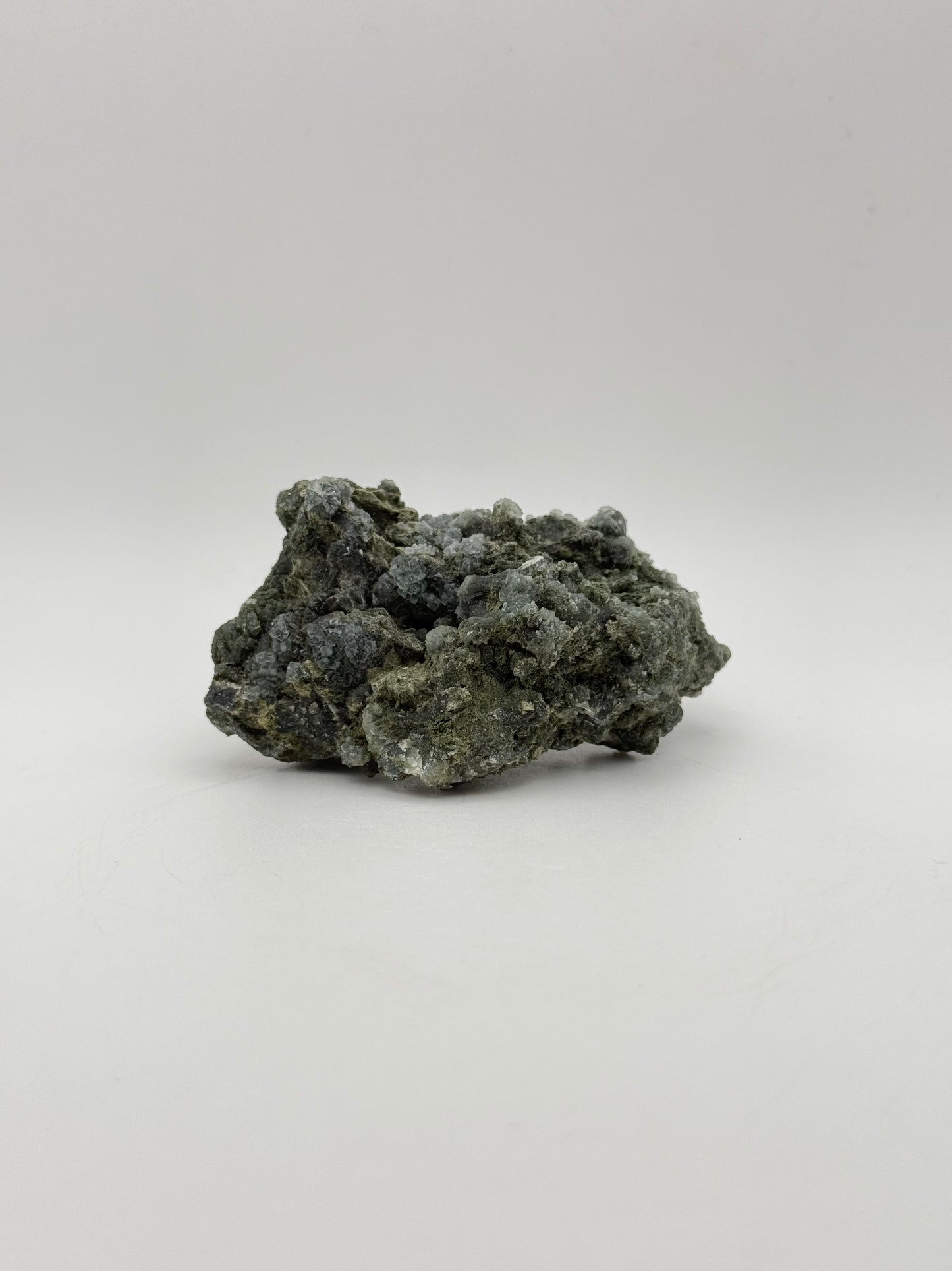 Raw prehnite specimen with amazing green color.