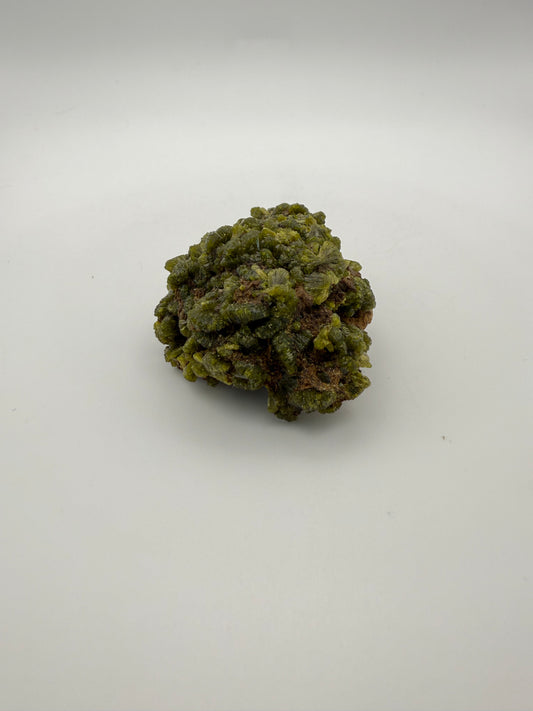 Epidote crystal cluster with good green color.