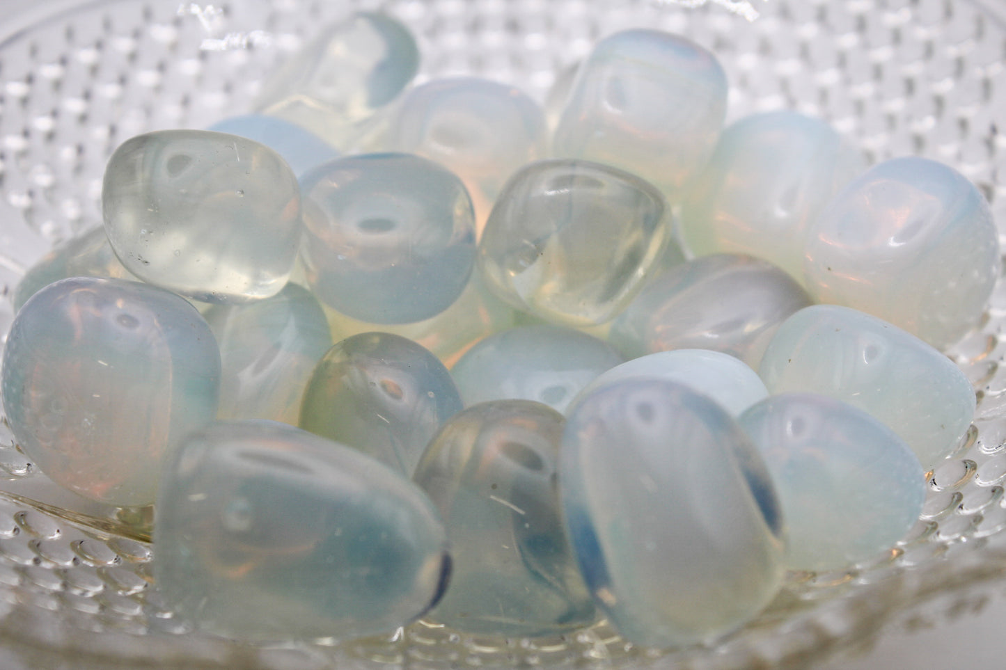 A collection of polished opalite tumbles.