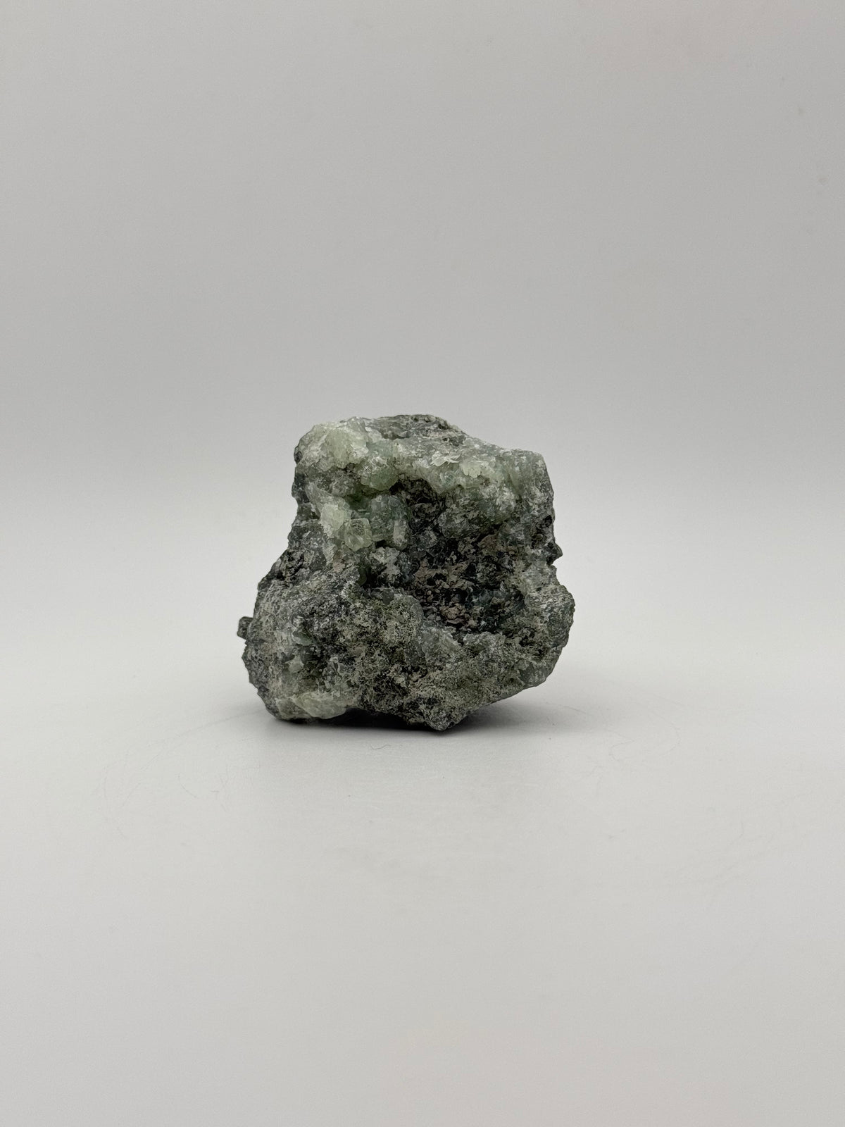 Raw prehnite specimen with amazing green color.