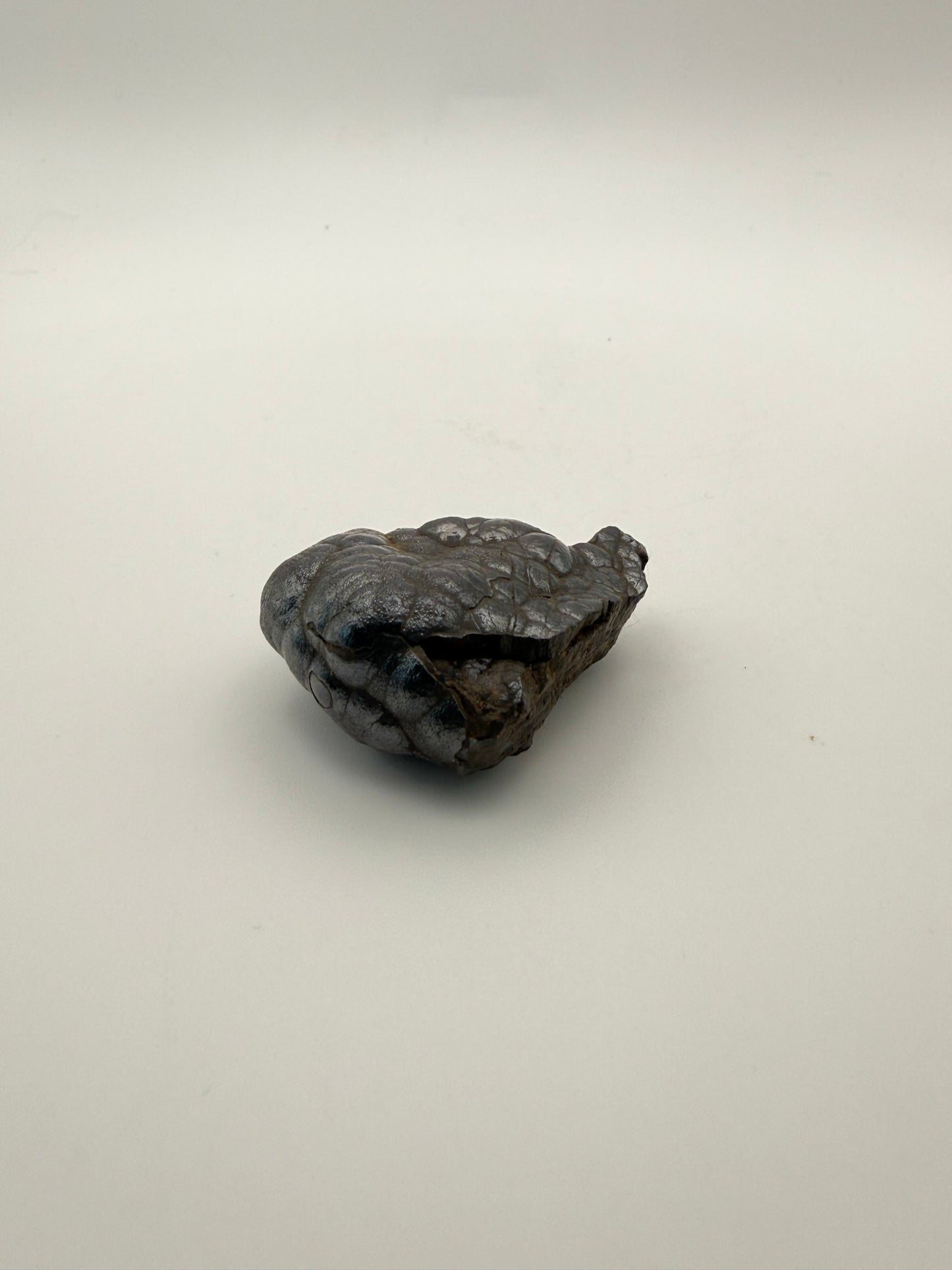 Small raw hematite specimen.