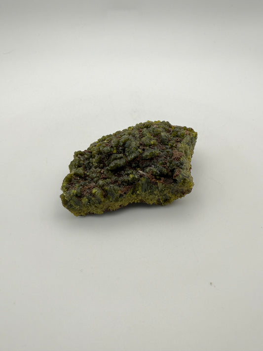 Epidote crystal cluster with good green color.