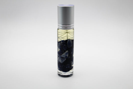 Roll on bottle with essential oils and the intention of "focus"