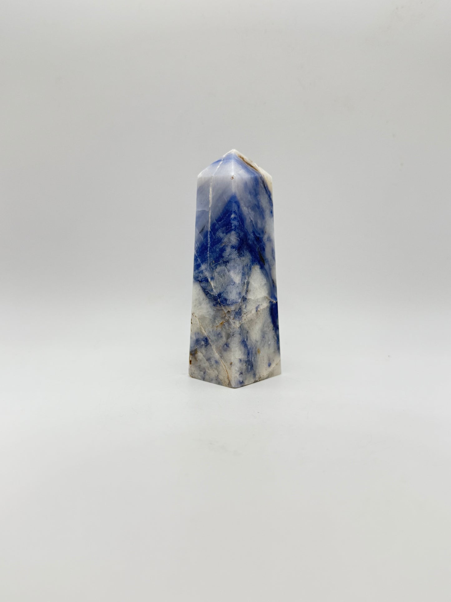 Afghanite four sided tower. Height of 3 5/8 inches, width of 1 1/8 inches.